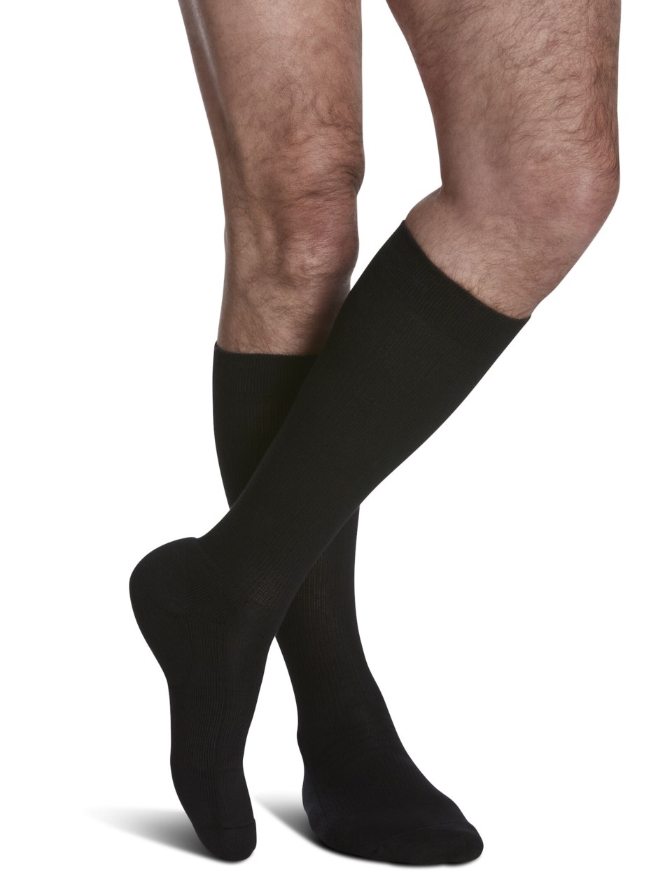 Male wearing MOTION CUSHIONED COTTON compression socks in BLACK