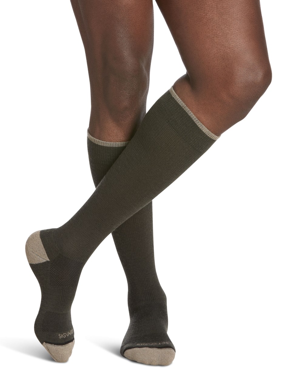 Male wearing MOTION THERMOREGULATING WOOL compression socks in OLIVE
