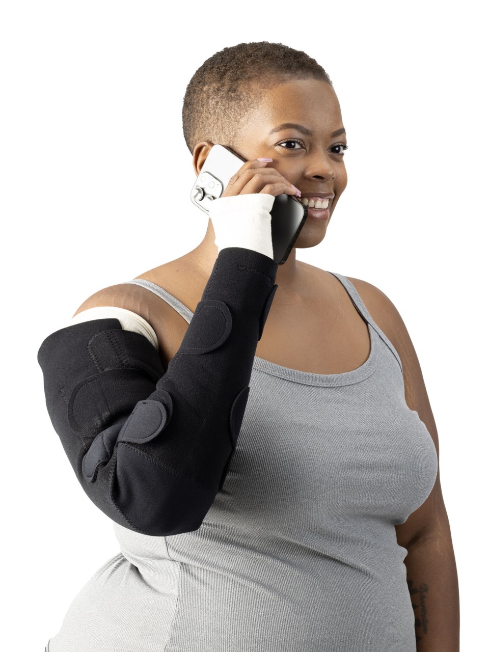 Woman wearing Sigvaris MCE Compreflex Standard Arm compression garment in black
