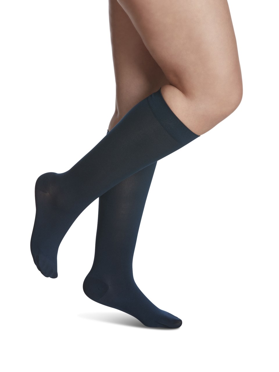 Female wearing STYLE SOFT OPAQUE compression calf stockings in MIDNIGHT BLUE