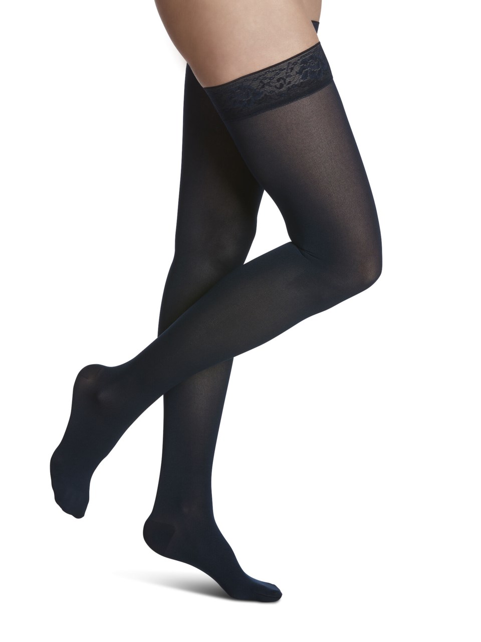 Female wearing STYLE SOFT OPAQUE compression thigh highs in MIDNIGHT BLUE