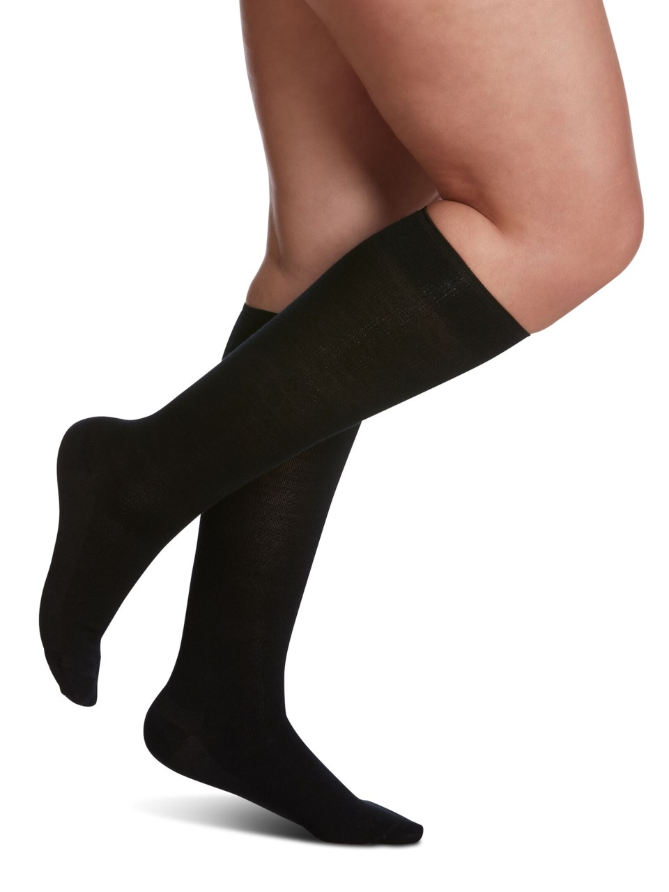 Female wearing STYLE MERINO WOOL compression socks in BLACK