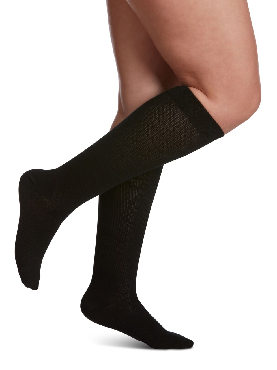 Female wearing WELLBEING CASUAL COTTON compression socks in BLACK